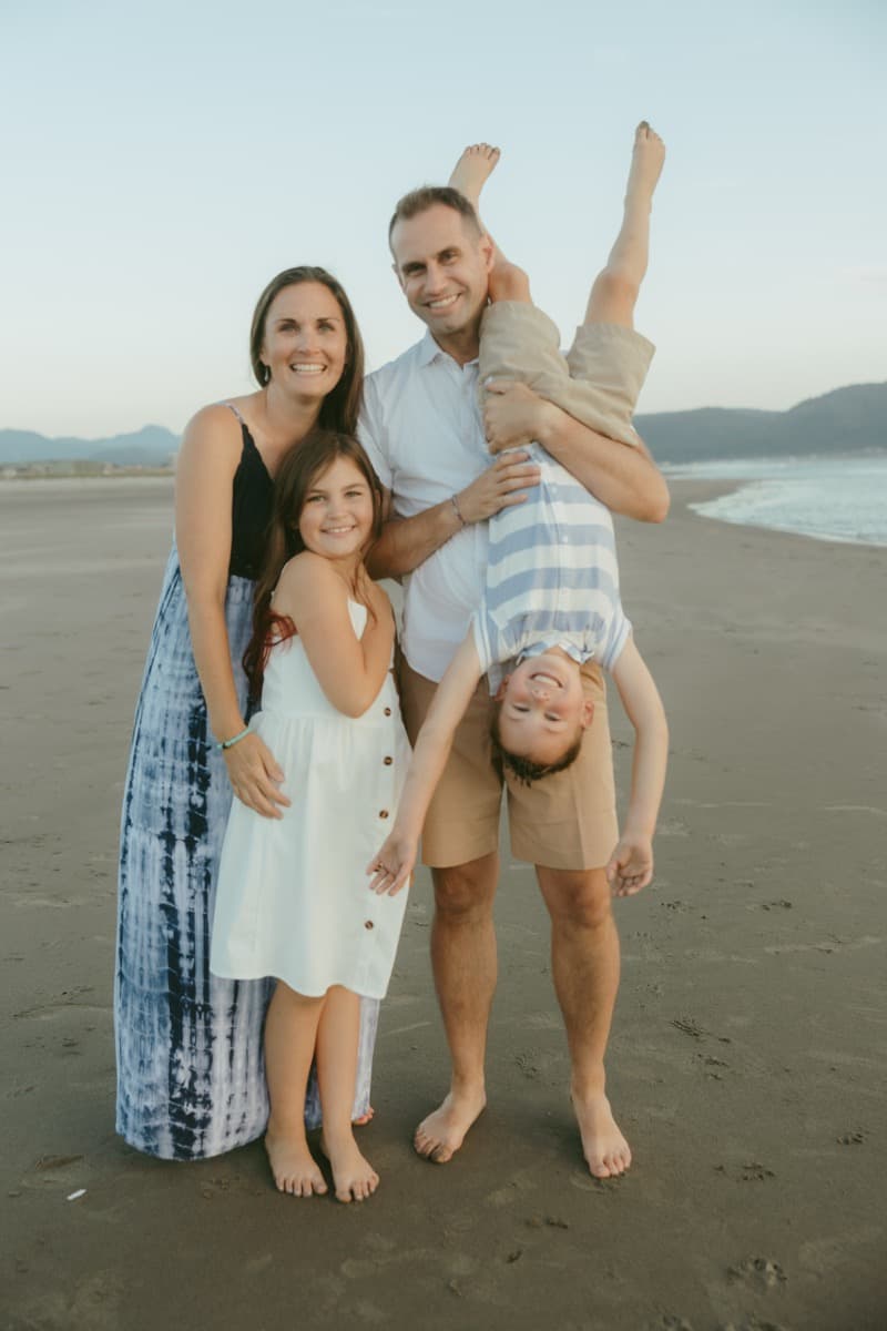 Family beach day - playful moment with kids